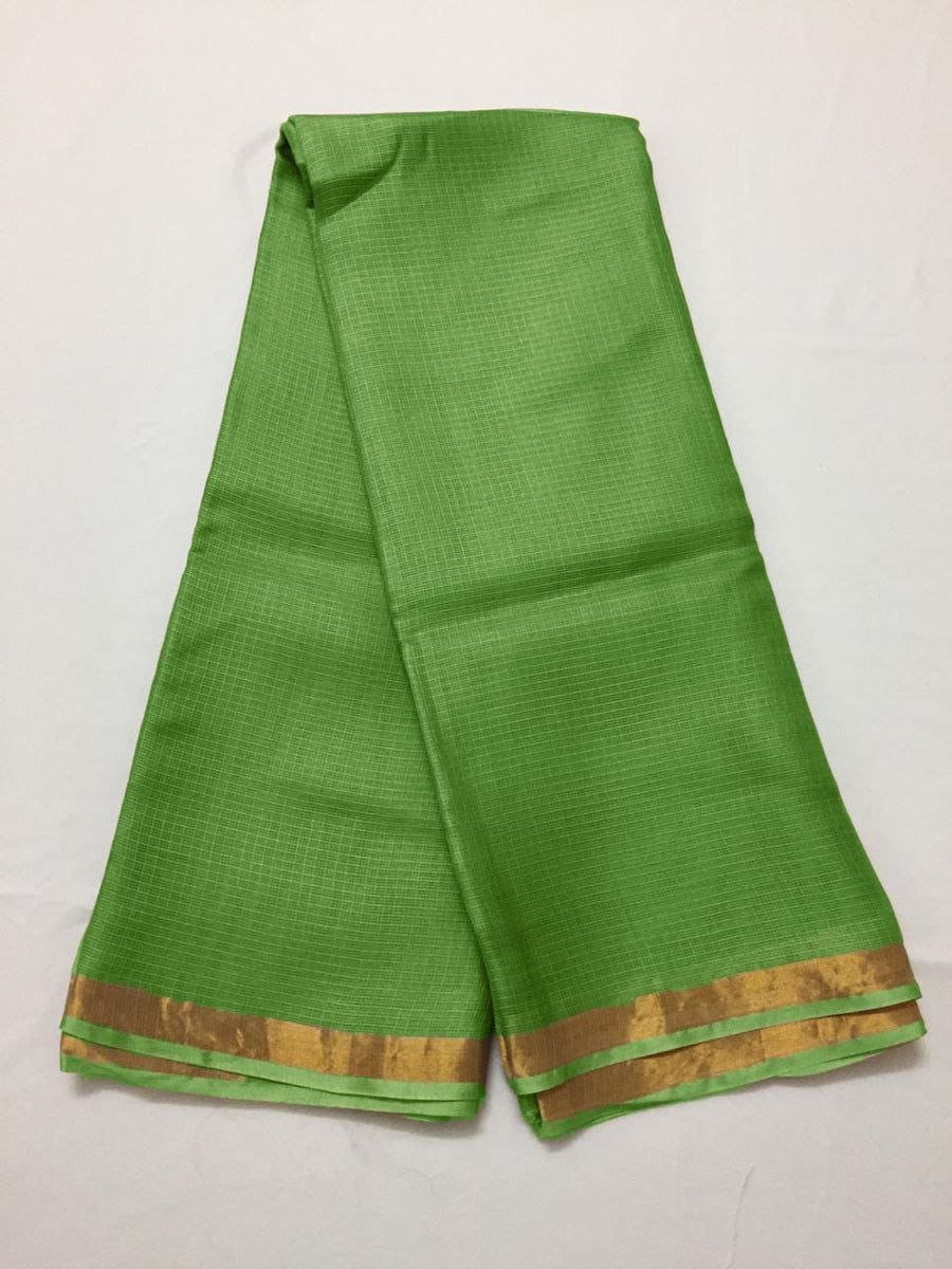 Green kota silk saree with a gold border