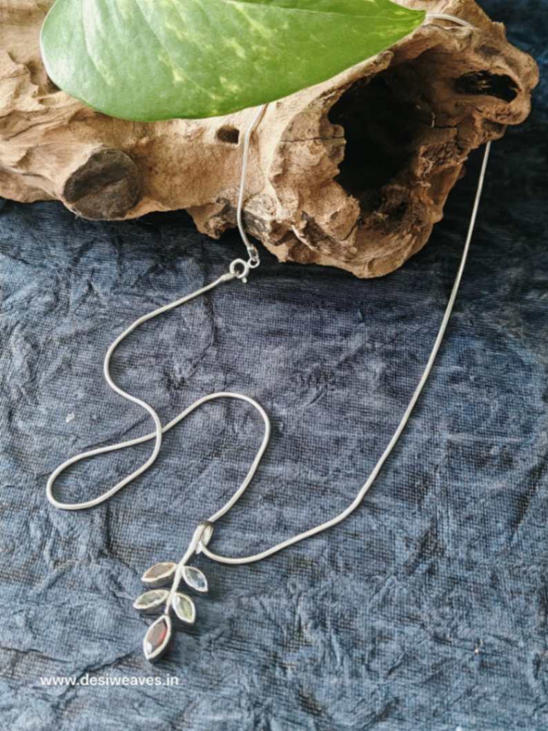 Silver necklace with a leaf-shaped pendant