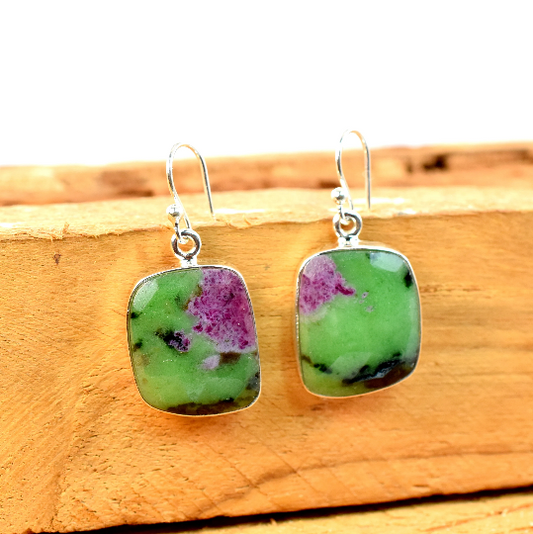 Green and purple stone earrings.