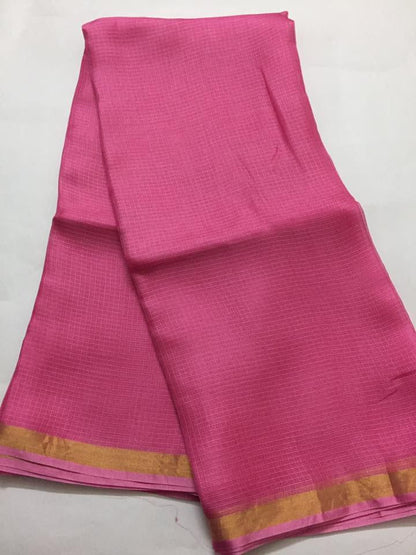 pink kota silk saree with a gold border 