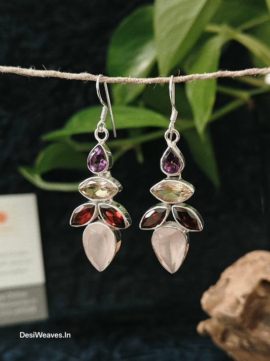 Pair of silver earrings with multicolored gemstones
