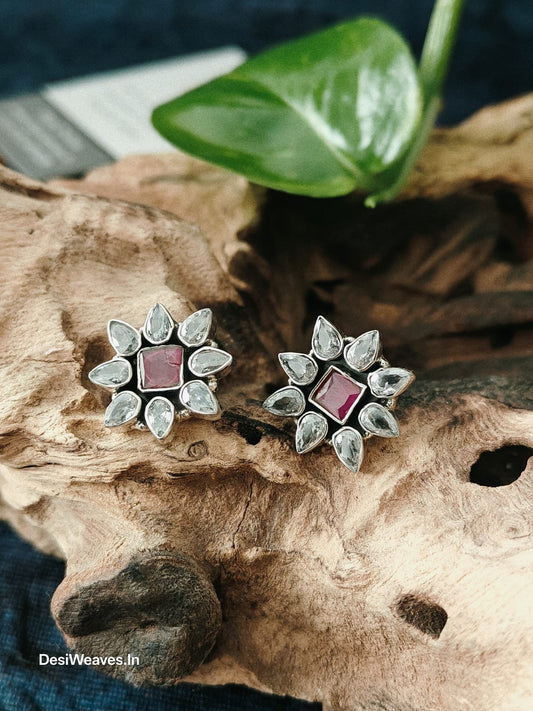 Silver earrings with pink gemstones 