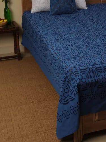 Blue patterned bedspread 