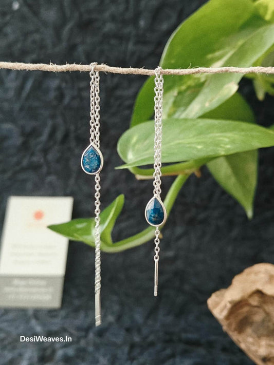 Silver earrings with blue teardrop stones 