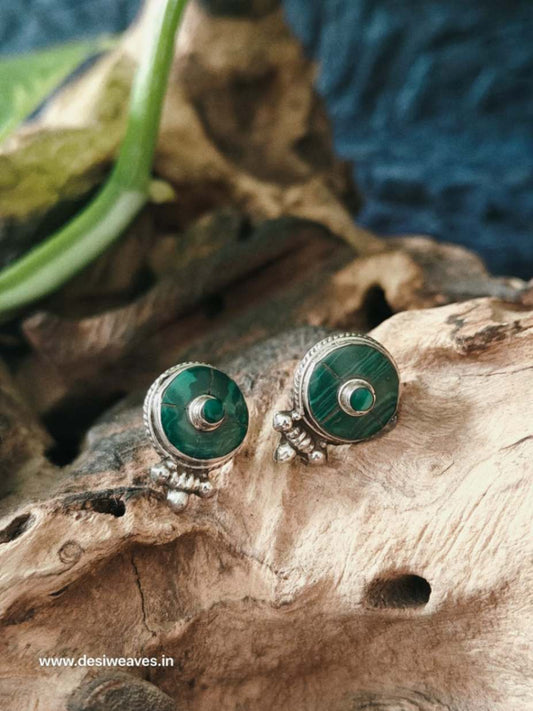 Silver earrings with green stones