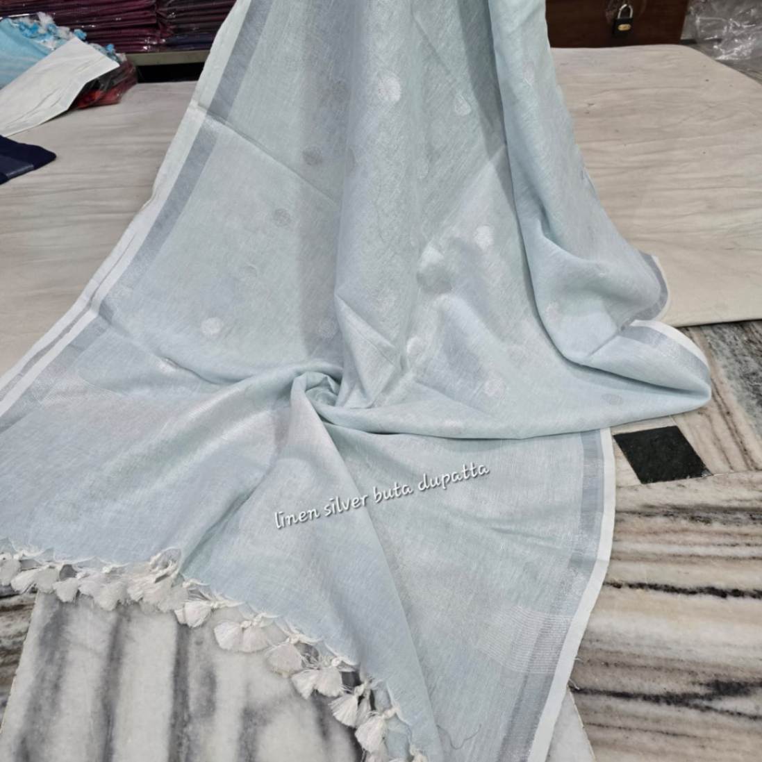 Light blue saree with white border
